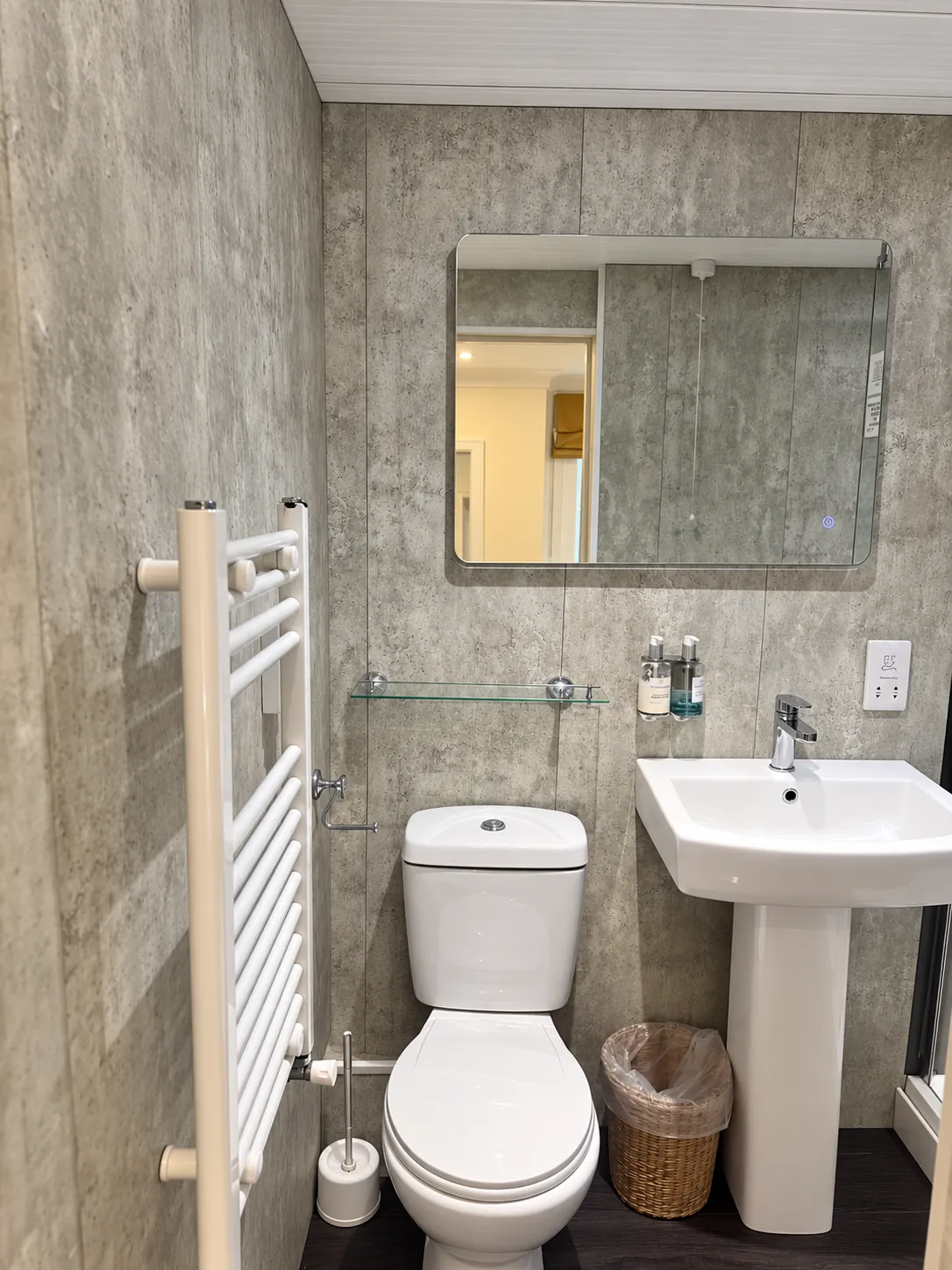 Room 3 en-suite basin, toilet and towel rail